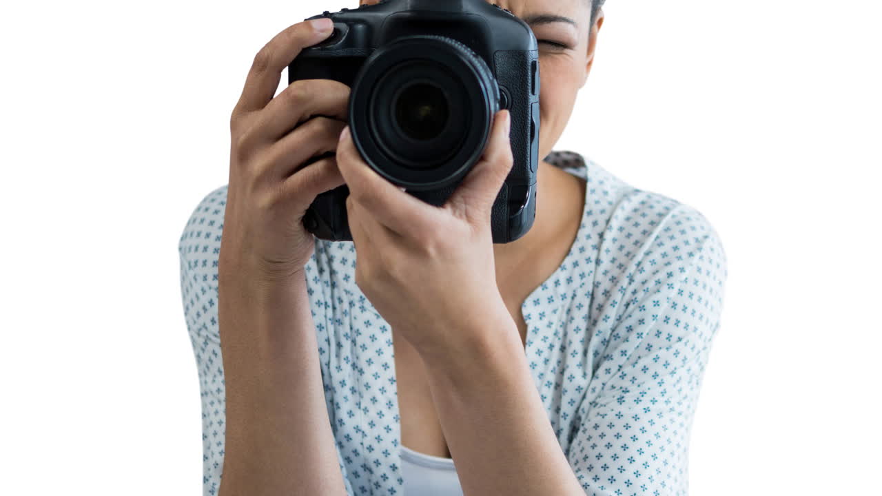 Animation of caucasian woman holding camera over white background