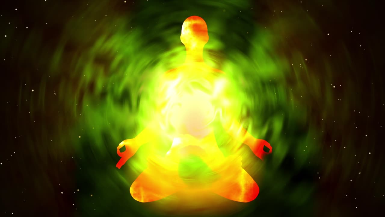 Silhouette of a person meditating with chakra energy loop effect on chest