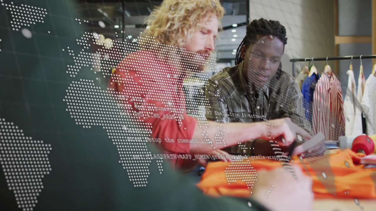 Two designers measuring orange garment, animated map and code drifting, device guiding final detail
