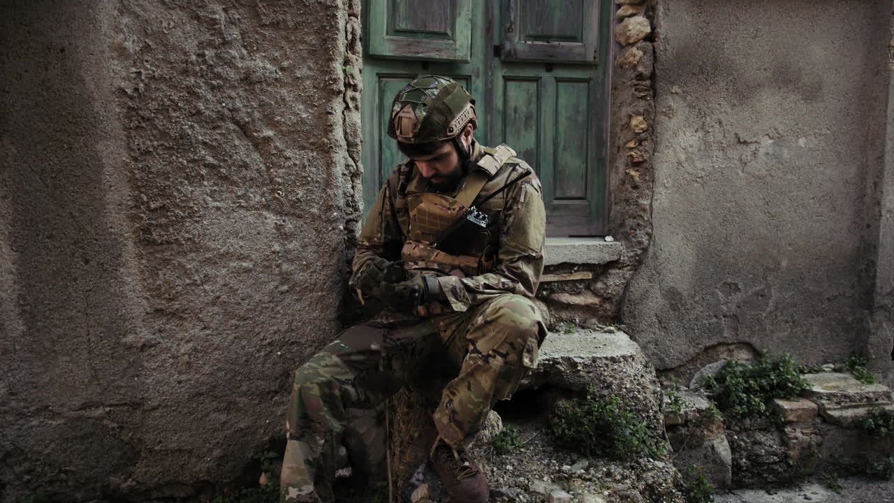 Young Soldier In War Opens The Compass To Understand His Location