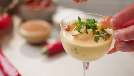preparing shrimp cocktail appetizer