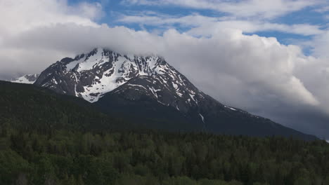 majestic yukon peaks under dramatic cloudy skies