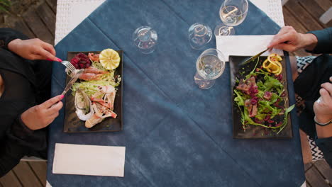 romantic date with a gourmet fish lunch at the outdoor restaurant