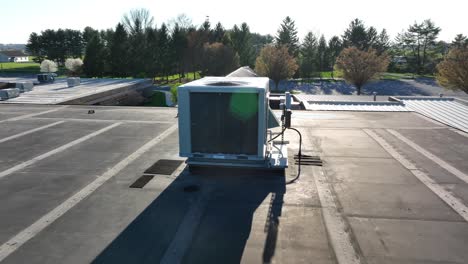 Aerial-orbit-of-large-rooftop-HVAC-industrial-ventilation-system