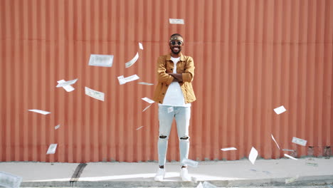 successful man in street style with money falling around him