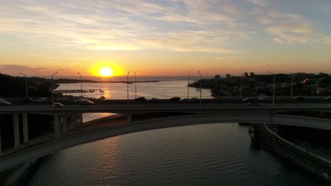 porto city arrábida bridge traffic and river douro at sunset aerial view