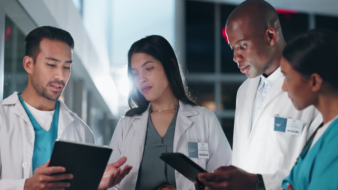 Hospital, team and doctors on tablet in discussion