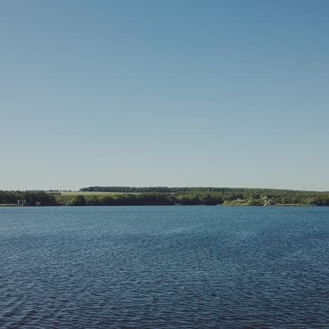 wonderful view of the wide river not far from shore in the summer