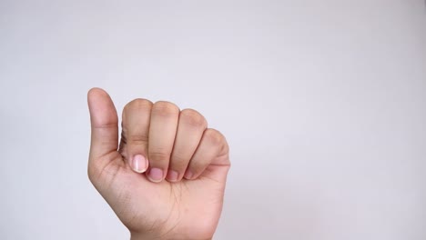 woman holding a gold ring