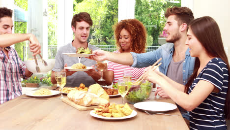 happy friends eating salad