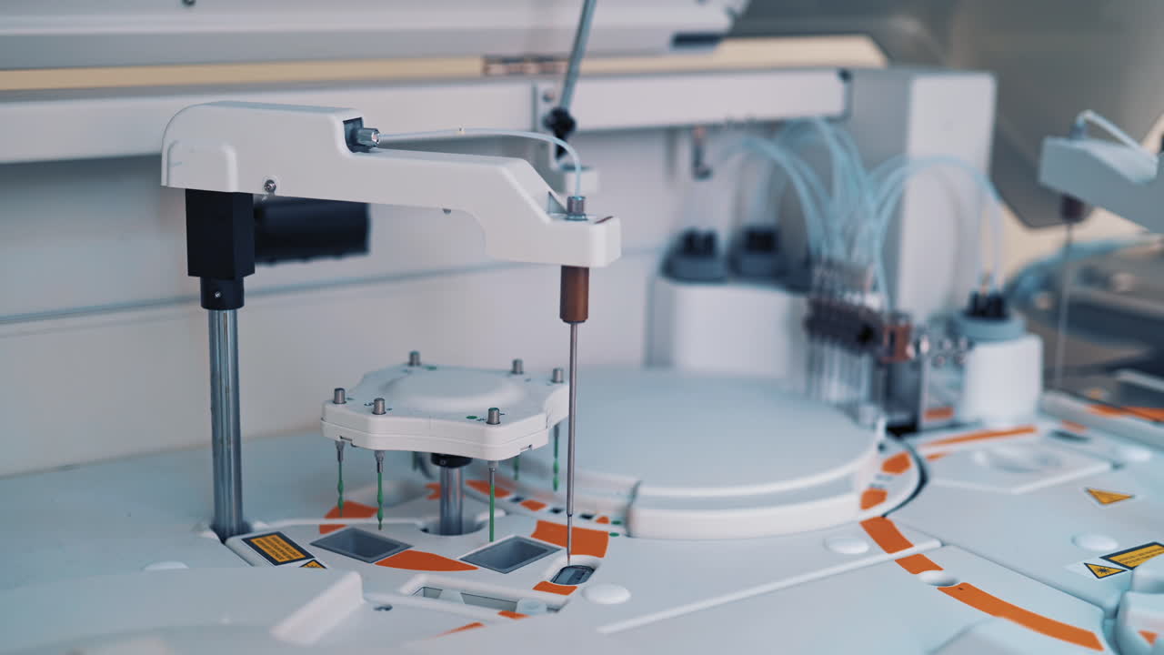 Functional medical laboratory with biochemical analyzer in it. Working process of automated machine in a laboratory. Chemical and biological laboratory of examining blood.