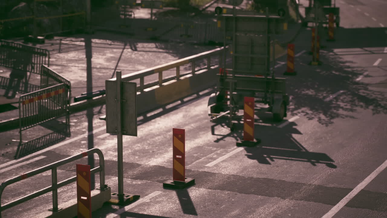 Road construction work in a quiet urban area during early morning hours