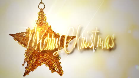 un ornamento de estrella de oro con las palabras "feliz navidad" escritas en él
