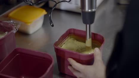 preparing a green smoothie or dessert