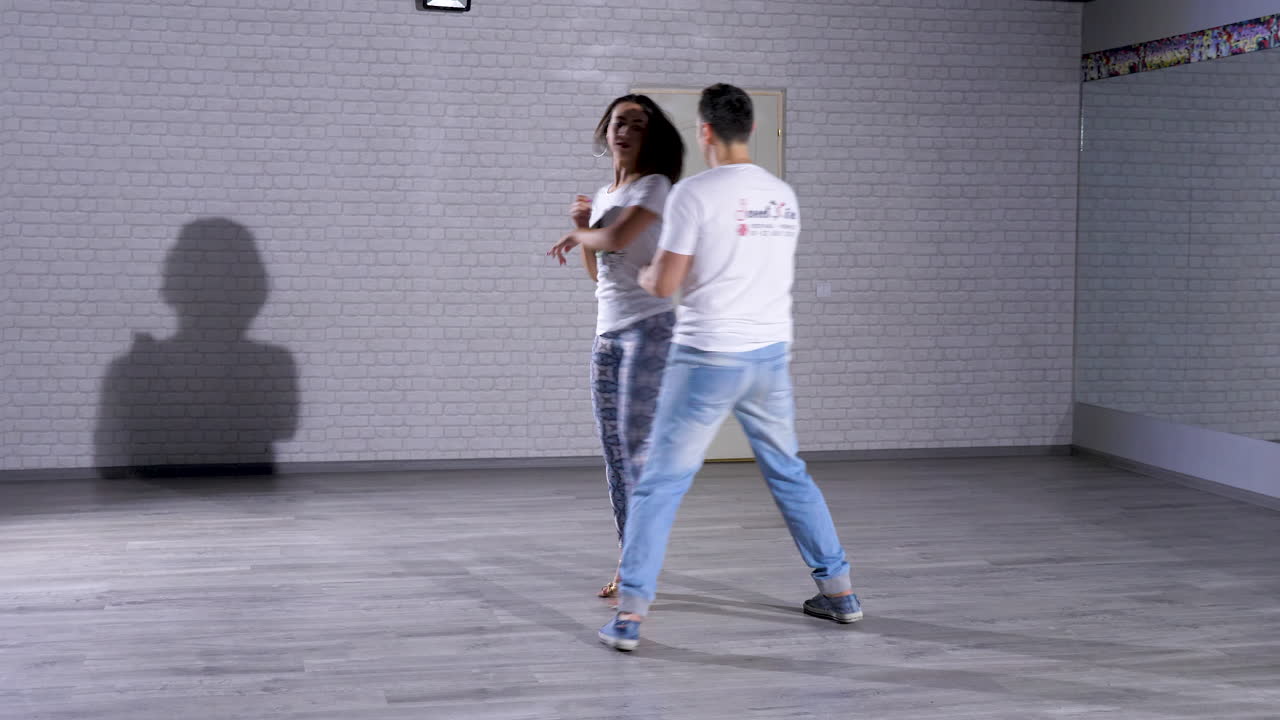 Dancing Salsa in a Studio