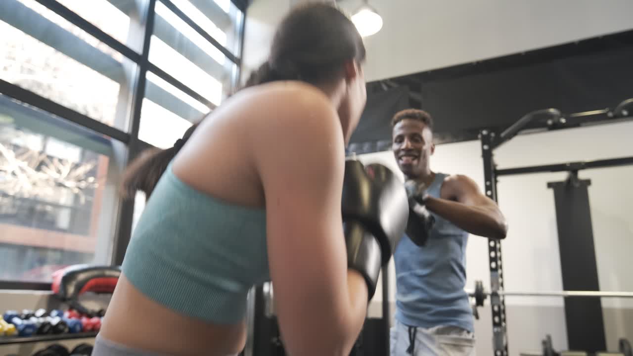 Couple Boxing Training Session in Gym
