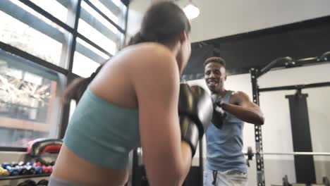 couple boxing training session in gym