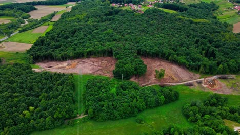 aerial 4k drone footage of environmental reality: rapid deforestation by human hands