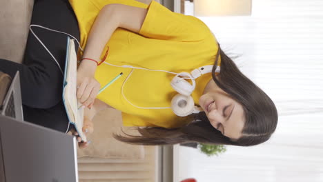 Vertical-video-of-Happy-and-satisfied-Female-student.