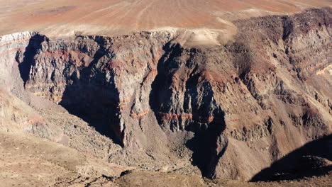 aerial rotating shot of different layers of rocks exposed as a result of continuous erosion in star wars canyon, california, usa