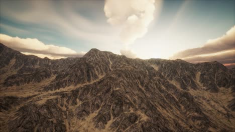 Sun-Rays-against-the-Backdrop-of-the-Mountains