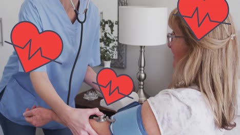 Animation-of-hearts-with-cardiograph-over-caucasian-female-doctor-and-patient