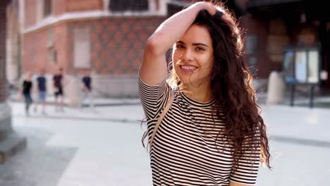 young woman going down the street