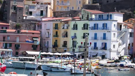 boats docked near vibrant buildings in sorrento