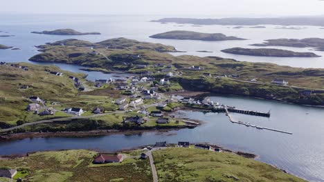 Static-drone-shot-of-the-Isle-of-Scalpay,-an-island-near-the-Isles-of-Harris-and-Lewis-on-the-Outer-Hebrides-of-Scotland