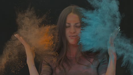 girl in color powder explosion slow motion