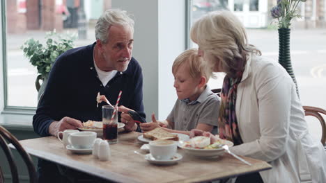 family enjoying a meal together at a restaurant