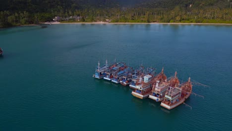 Best-aerial-top-view-flight
Boats-anchoring-in-sea,-island-Ko-Kut-Ao-Phrao-beach,-Thailand-2022