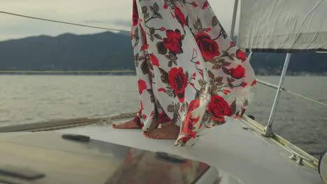 woman in a floral dress on a yacht
