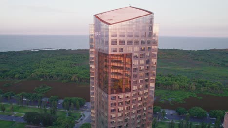 aerial orbit of ypf corporate office skyscraper, puerto madero, argentina