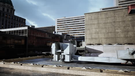 a very large building with some very tall buildings in the background