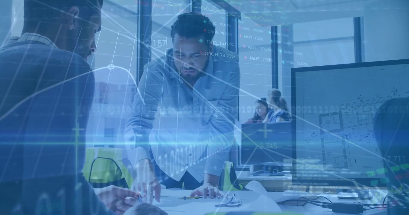 Technical lead entering shot and examining blueprint while generating finance charts for analysis