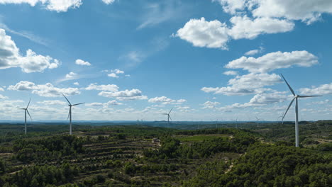 Fast-moving-hyperlapse-over-spinning-wind-turbines-with