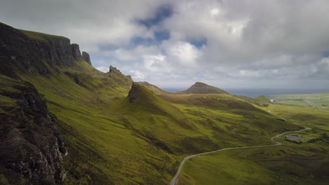 A-timelapse-of-the-Quiraing-valley-on-the-Isle-of-Skye-on-an-overcast-day-with-the-clouds-moving-quickly-across-the-valley,-Inner-Hebrides,-Scotland
