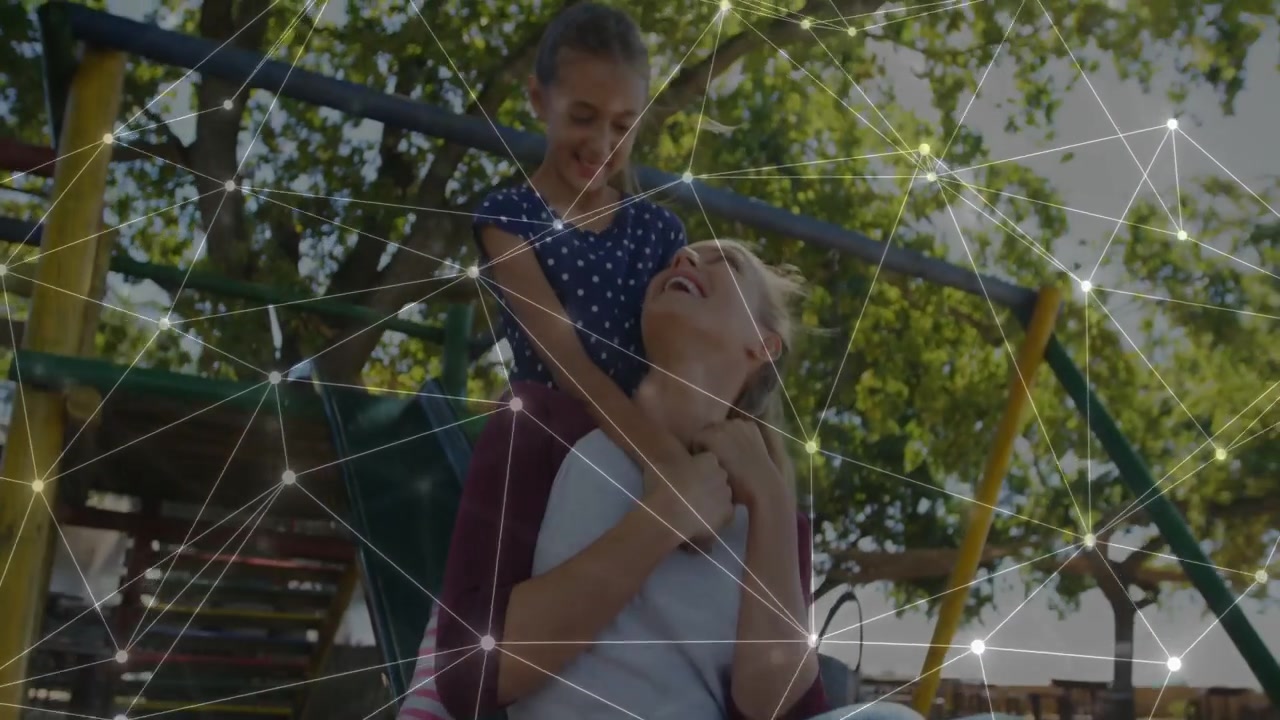 Child reaching, hugging mother on playground swing, mother laughing, mesh overlay showing parenting