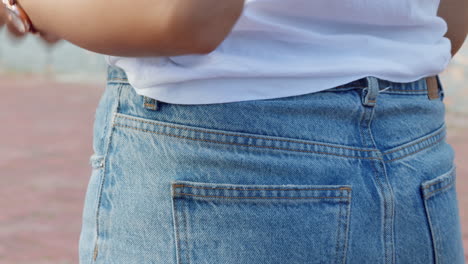 woman, phone and casual jeans pocket