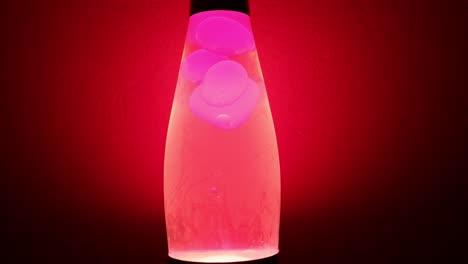 lava lamp with red lava, 70s design, on clear background