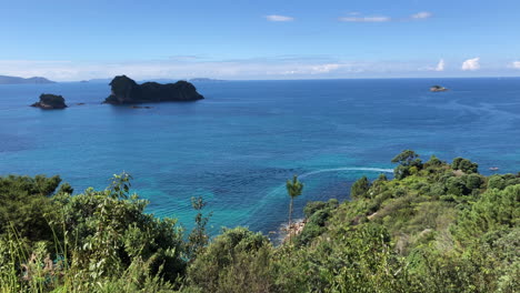 ocean view from the coromandel peninsula in new zealand on a bright sunny summer day