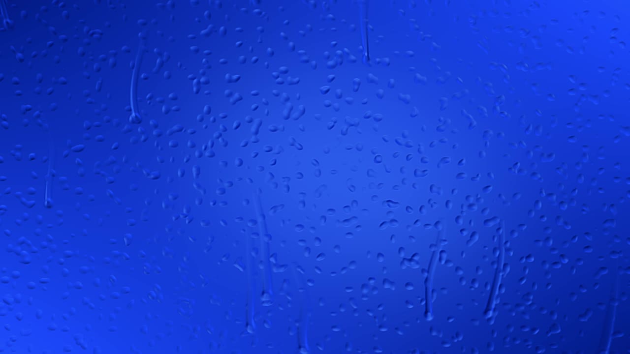 An animation of raindrops slowly gliding down on the window glass against a moody blue gradient background with highlights that are reflecting on the droplets