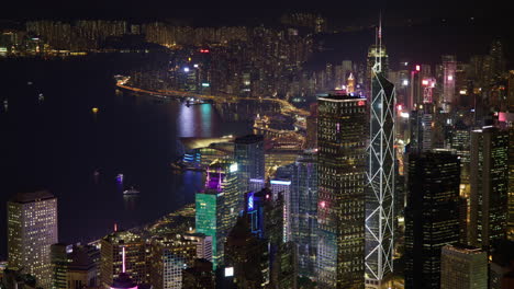 hong kong victoria harbour cityscape night timelapse of sparkling city lights and skyscrapers
