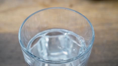 water being poured into a glass