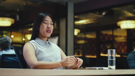 Asian woman in a business meeting