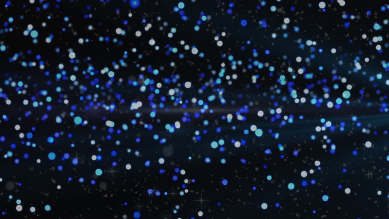 검은색 배경 위에 눈송이와 반이는 파란색 반점의 애니메이션