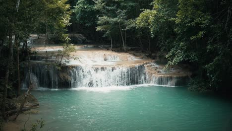 Sunlit-Waterfall-in-Erawan-National-Park,-Thailand