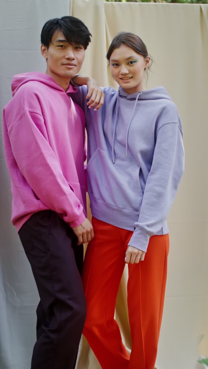 People wearing fashionable hoodies