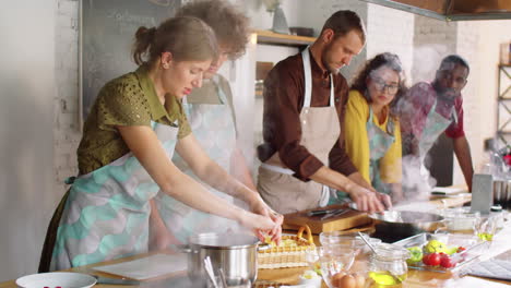 woman preparing pasta during cooking master class